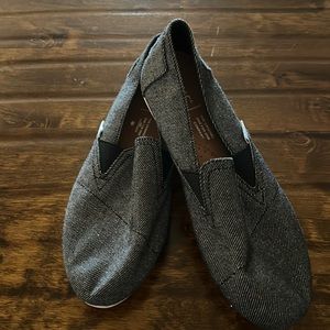 Toms black denim slip ons